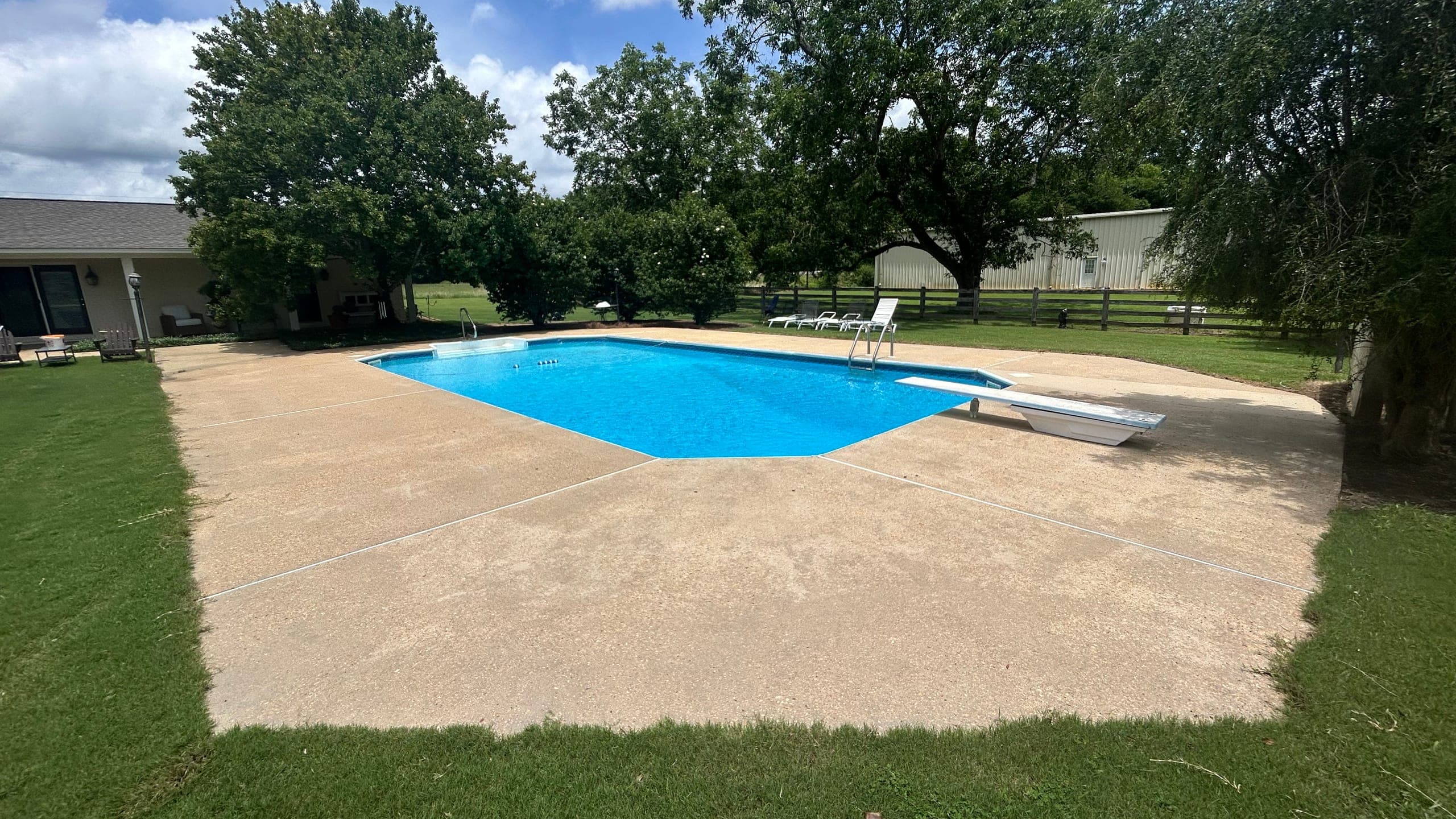 A freshly pressure-washed pool deck and patio in Oxford, Mississippi
